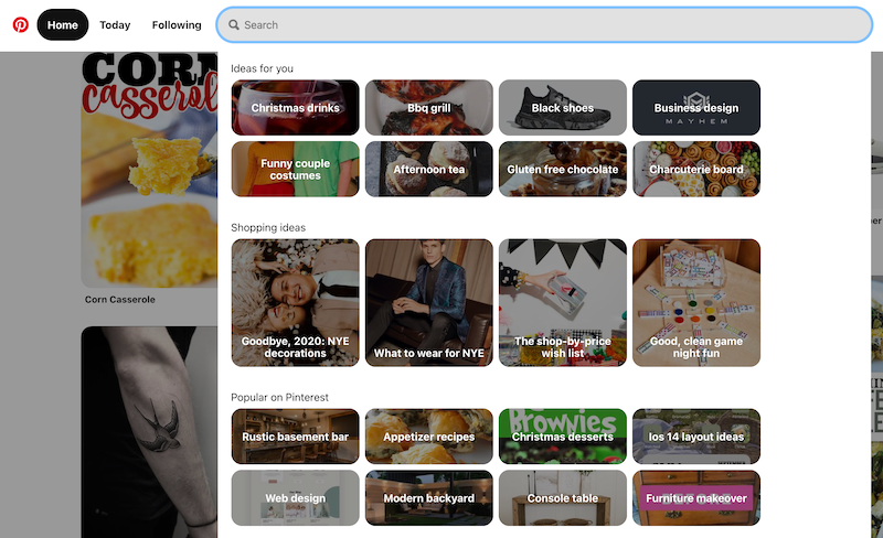The Pinterest homefeed showing rows of recommended interests like Christmas drinks, NYE decorations, and appetizer recipes